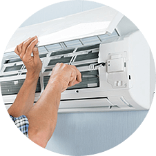 Technician repairing an appliance